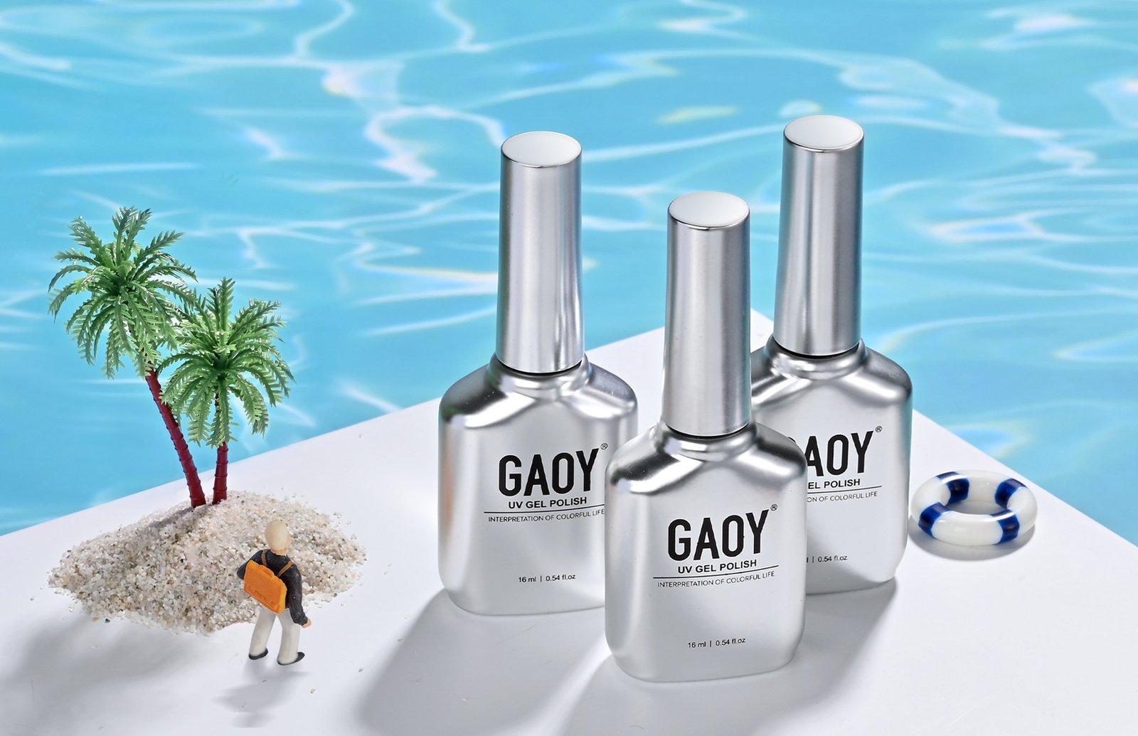 Nail polish bottles by pool